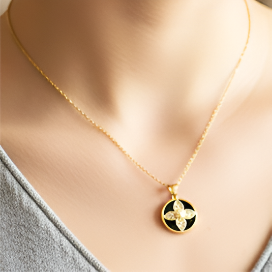 Black Whirl Golden Flower Pendant