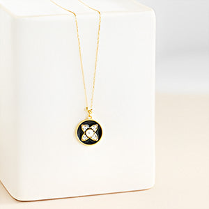 Black Whirl Golden Flower Pendant