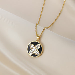 Black Whirl Golden Flower Pendant